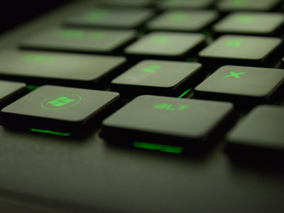 Close-up Photography of Black and Green Windows computer keyboard keys